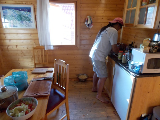 Dave preparing a salad in the kitchen